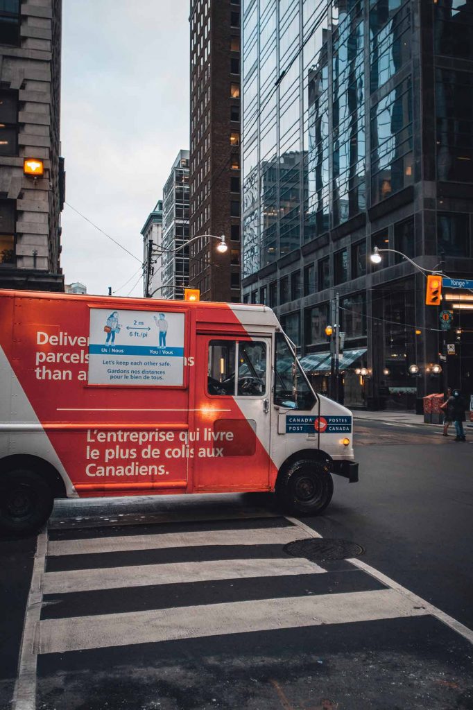 Canada Post delivery truck at intersection
